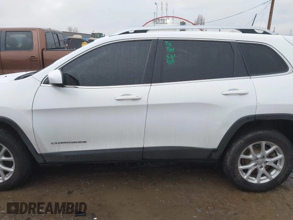 2018 Jeep Cherokee Latitude Tech Connect with VIN 1C4PJMCB1JD509136, listed as a IAAI auction lot 40873652 with 95,241 mi miles and . Bid and sale history available at DreamBid. Image 14.