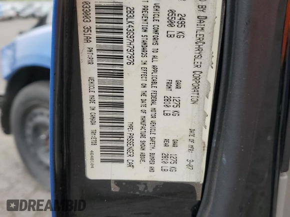2007 Dodge Charger SXT z VIN 2B3LK43G97H797976, wystawiony jako Copart lot #69449804 z przebiegiem 245 852 mil mil oraz Szkoda całkowita • Salvage title. Historia ofert i sprzedaży dostępna na DreamBid. Obrazek 14.