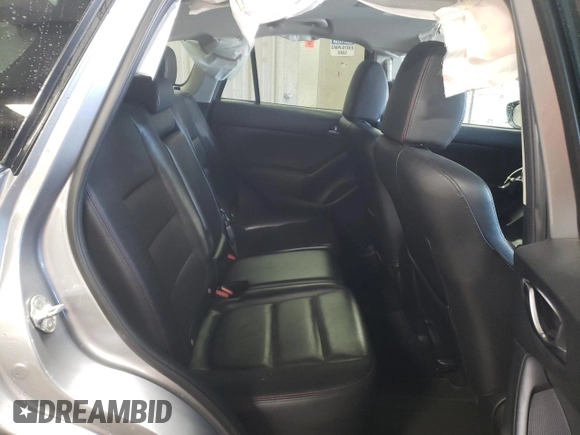 2015 Mazda CX-5 Grand Touring with VIN JM3KE4DY5F0456142, listed as a Copart auction lot 49353845 with 193,512 mi miles and Salvage Title. Bid and sale history available at carsss.com. Image 10.