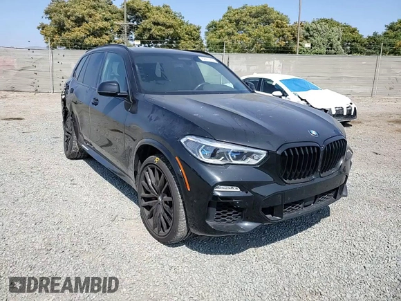 2021 BMW X5 sDrive40i with VIN 5UXCR4C00M9F54602, listed as a Copart auction lot 62417255 with 42,110 mi miles and Salvage title. Bid and sale history available at DreamBid. Image 14.