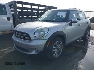 2015 MINI Countryman with VIN WMWZB3C56FWR46360, listed as a IAAI auction lot 41691359 with 88,305 mi miles and . Bid and sale history available at DreamBid. Image 2.