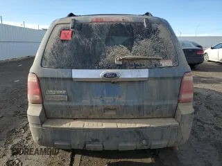 2010 Ford Escape Limited with VIN 1FMCU9E77AKD23121, listed as a Copart auction lot 50243295 with Not provided miles and Salvage title. Bid and sale history available at DreamBid. Image 6.