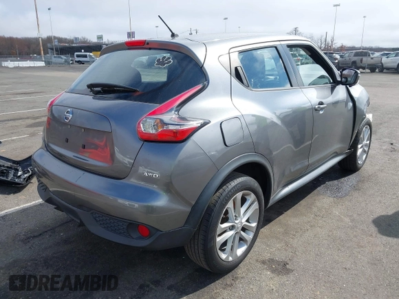 2015 Nissan Juke SV with VIN JN8AF5MVXFT553675, listed as a IAAI auction lot 41815944 with 100,000 mi miles and . Bid and sale history available at DreamBid. Image 4.