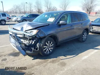 2021 Honda Pilot EX-L with VIN 5FNYF6H54MB028203, listed as a IAAI auction lot 41641116 with 46,755 mi miles and . Bid and sale history available at DreamBid. Image 2.