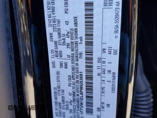 2023 Ford F-150 Lightning Pro with VIN 1FTVW1EL8PWG53681, listed as a Copart auction lot 42681505 with 7,570 mi miles and Salvage Title. Bid and sale history available at DreamBid. Image 12.