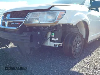 2019 Dodge Journey SE Value with VIN 3C4PDCAB2KT810207, listed as a IAAI auction lot 40991409 with Not Provided miles and . Bid and sale history available at DreamBid. Image 16.