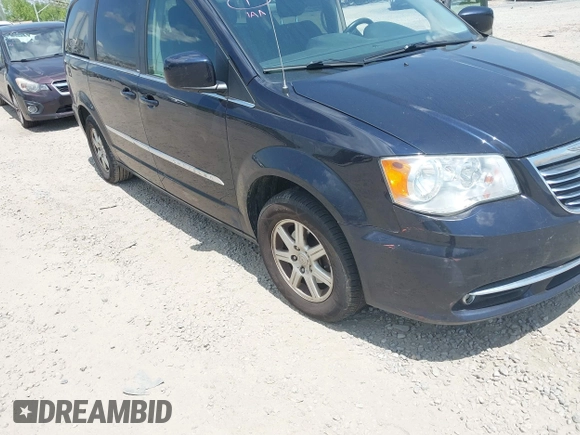 2011 Chrysler Town & Country Touring with VIN 2A4RR5DG7BR697932, listed as a IAAI auction lot 42231254 with 151,866 mi miles and . Bid and sale history available at DreamBid. Image 6.