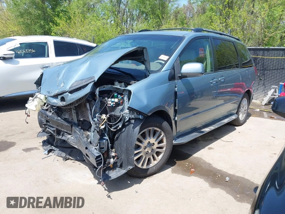 2009 Toyota Sienna XLE with VIN 5TDZK22C99S239755, listed as a IAAI auction lot 42096411 with 214,983 mi miles. Bid and sale history available at carsss.com. Image 18.