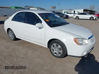 2006 Kia Spectra EX z VIN KNAFE121965369553, wystawiony jako IAAI lot #41384926 z przebiegiem 145 599 mil mil oraz . Historia ofert i sprzedaży dostępna na DreamBid. Obrazek 1.