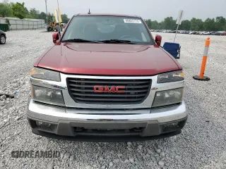 2010 GMC Canyon SLE1 with VIN 1GTJTCDE4A8143006, listed as a Copart auction lot 60853175 with 148,457 mi miles and Salvage title. Bid and sale history available at DreamBid. Image 5.