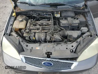 2007 Ford Focus S z VIN 1FAFP34N67W111209, wystawiony jako Copart lot #52708405 z przebiegiem 100 538 mil mil oraz Czysty tytuł • Clean title. Historia ofert i sprzedaży dostępna na DreamBid. Obrazek 11.
