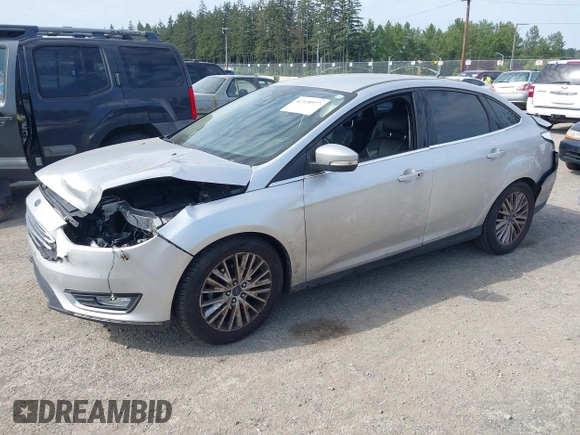 2016 Ford Focus Titanium with VIN 1FADP3J20GL238914, listed as a IAAI auction lot 42338977 with 126,276 mi miles and . Bid and sale history available at DreamBid. Image 2.