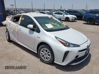 2022 Toyota Prius L Eco z VIN JTDKAMFU6N3162518, wystawiony jako IAAI lot #42390932 z przebiegiem Nie podano mil oraz . Historia ofert i sprzedaży dostępna na DreamBid. Obrazek 1.