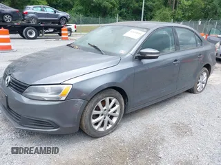 2012 Volkswagen Jetta SE with VIN 3VWDX7AJ6CM325280, listed as a IAAI auction lot 42634898 with 215,384 mi miles and . Bid and sale history available at DreamBid. Image 2.