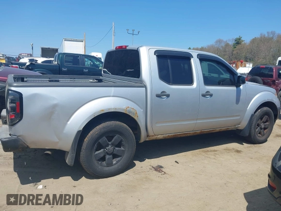 2011 Nissan Frontier Pro-4X with VIN 1N6AD0EVXBC407089, listed as a IAAI auction lot 42113537 with 124,853 mi miles and . Bid and sale history available at DreamBid. Image 13.