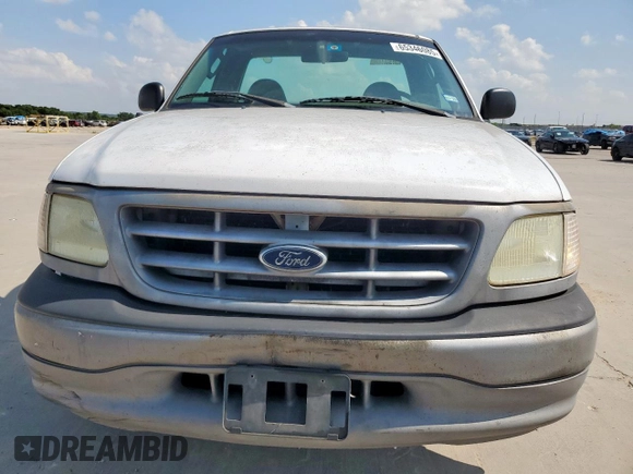 2003 Ford F-150 XL z VIN 1FTRF17263NB24929, wystawiony jako Copart lot #65346085 z przebiegiem 203 401 mil mil oraz Czysty tytuł • Clean title. Historia ofert i sprzedaży dostępna na DreamBid. Obrazek 5.