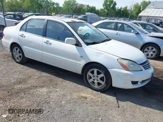 2006 Mitsubishi Lancer ES z VIN JA3AJ26E16U062703, wystawiony jako IAAI lot #42244328 z przebiegiem 93 950 mil mil oraz . Historia ofert i sprzedaży dostępna na DreamBid. Obrazek 1.