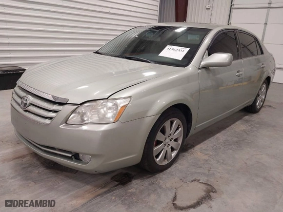 2005 Toyota Avalon XL with VIN 4T1BK36B65U023629, listed as a IAAI auction lot 41963531 with 255,044 mi miles. Bid and sale history available at carsss.com. Image 2.