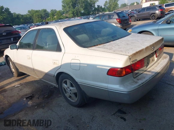2001 Toyota Camry CE with VIN JT2BG22K010570556, listed as a IAAI auction lot 42458031 with 357,046 mi miles and . Bid and sale history available at DreamBid. Image 3.