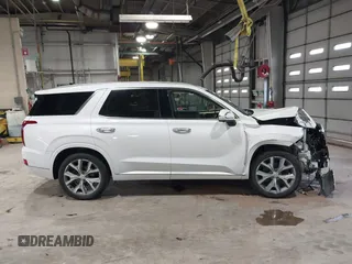 2021 Hyundai Palisade Limited z VIN KM8R5DHEXMU210597, wystawiony jako IAAI lot #41869656 z przebiegiem 56 874 mil mil oraz . Historia ofert i sprzedaży dostępna na DreamBid. Obrazek 13.