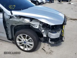 2019 Ford Fusion Hybrid SE with VIN 3FA6P0LU8KR242998, listed as a Copart auction lot 48927543 with 102,036 mi miles. Bid and sale history available at carsss.com. Image 9.