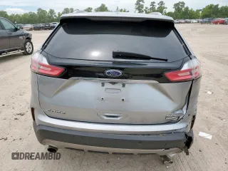 2020 Ford Edge SEL with VIN 2FMPK3J90LBA71592, listed as a Copart auction lot 62362655 with 100,040 mi miles and Salvage title. Bid and sale history available at DreamBid. Image 6.