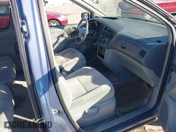 1999 Toyota Sienna LE with VIN 4T3ZF13C2XU126738, listed as a IAAI auction lot 41012127 with 218,080 mi miles. Bid and sale history available at carsss.com. Image 5.
