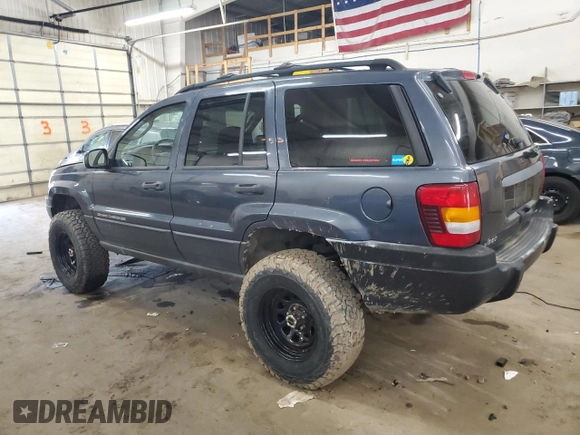 2004 Jeep Grand Cherokee Laredo with VIN 1J4GW48S24C294185, listed as a Copart auction lot 53357945 with 209,169 mi miles and Clean Title. Bid and sale history available at carsss.com. Image 2.