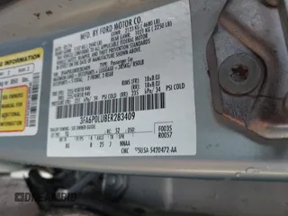 2014 Ford Fusion SE Hybrid with VIN 3FA6P0LU8ER283409, listed as a IAAI auction lot 40984629 with 206,605 mi miles. Bid and sale history available at carsss.com. Image 9.