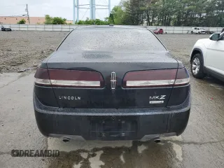 2012 Lincoln MKZ Hybrid z VIN 3LNDL2L32CR806299, wystawiony jako Copart lot #56191035 z przebiegiem 185 834 mil mil oraz Szkoda całkowita • Salvage title. Historia ofert i sprzedaży dostępna na DreamBid. Obrazek 6.