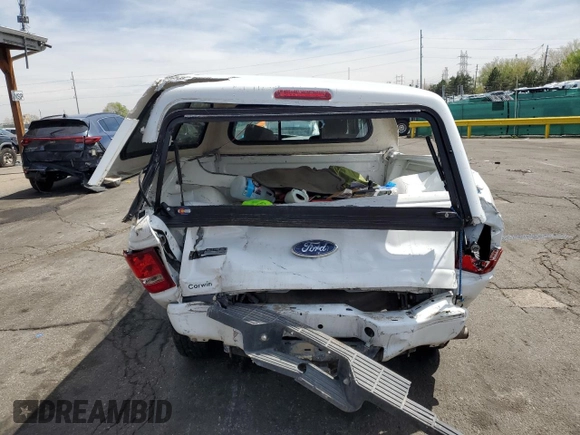 2010 Ford Ranger XLT with VIN 1FTLR4FE4APA24484, listed as a Copart auction lot 54427415 with 67,495 mi miles and Salvage title. Bid and sale history available at DreamBid. Image 6.