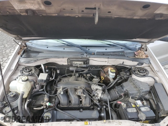 2001 Ford Escape XLS with VIN 1FMYU02111KA37010, listed as a Copart auction lot 52328415 with 312,425 mi miles and Salvage title. Bid and sale history available at DreamBid. Image 12.