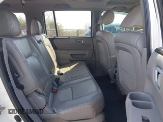 2013 Honda Pilot Touring with VIN 5FNYF3H9XDB006353, listed as a IAAI auction lot 41826557 with 174,552 mi miles and . Bid and sale history available at DreamBid. Image 8.
