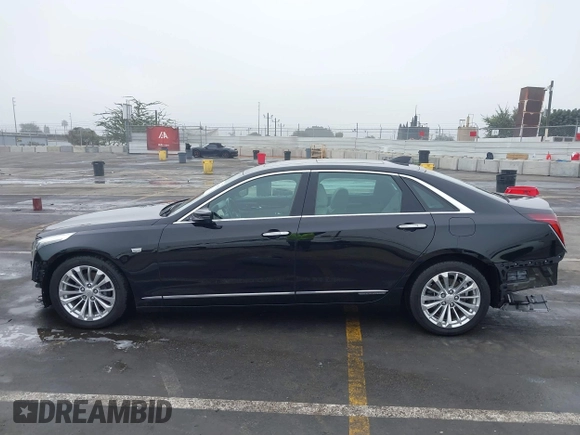 2017 Cadillac CT6 Plug-In RWD with VIN LREKK5RX4HA044882, listed as a IAAI auction lot 41241965 with 79,620 mi miles and . Bid and sale history available at DreamBid. Image 15.