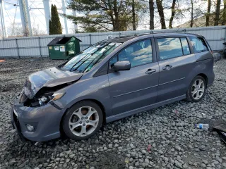2009 Mazda 5 Sport with VIN JM1CR29L090358157, listed as a Copart auction lot 87040574 with 197,223 mi miles and Salvage Title. Bid and sale history available at DreamBid. Image 1.