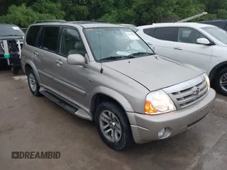 2004 Suzuki XL-7 LX with VIN JS3TX92V244114426, listed as a IAAI auction lot 42112014 with 169,377 mi miles. Bid and sale history available at carsss.com. Image 1.