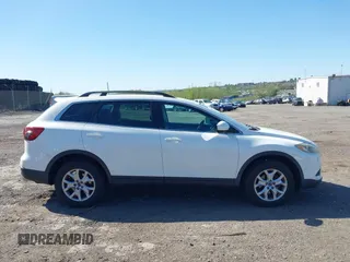 2015 Mazda CX-9 Touring with VIN JM3TB3CV1F0461403, listed as a IAAI auction lot 42148325 with 143,452 mi miles. Bid and sale history available at carsss.com. Image 13.