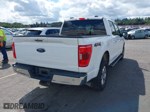 2021 Ford F-150 XL with VIN 1FTFW1E56MFA73752, listed as a IAAI auction lot 42267561 with 86,438 mi miles and . Bid and sale history available at DreamBid. Image 4.