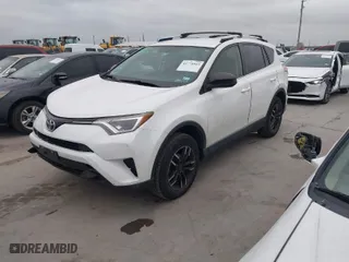 2016 Toyota RAV4 LE with VIN JTMZFREV9GD090539, listed as a IAAI auction lot 41774949 with 106,339 mi miles. Bid and sale history available at carsss.com. Image 2.