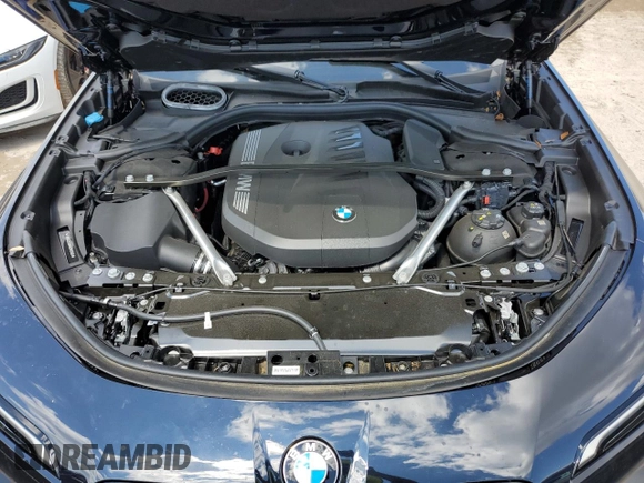 2024 BMW 7 Series 740i z VIN WBA23EH00RCP83346, wystawiony jako Copart lot #74360314 z przebiegiem Nie podano mil oraz Nie do naprawy • Non repairable. Historia ofert i sprzedaży dostępna na DreamBid. Obrazek 11.