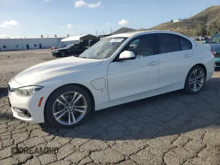 2017 BMW 3 Series 330e iPerformance with VIN WBA8E1C53HK480307, listed as a Copart auction lot 47618215 with 74,924 mi miles and Salvage Title. Bid and sale history available at carsss.com. Image 1.