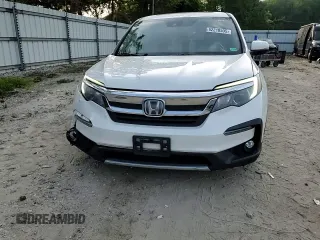2019 Honda Pilot EX-L with VIN 5FNYF5H44KB009679, listed as a Copart auction lot 62210505 with 148,628 mi miles and Salvage title. Bid and sale history available at DreamBid. Image 14.
