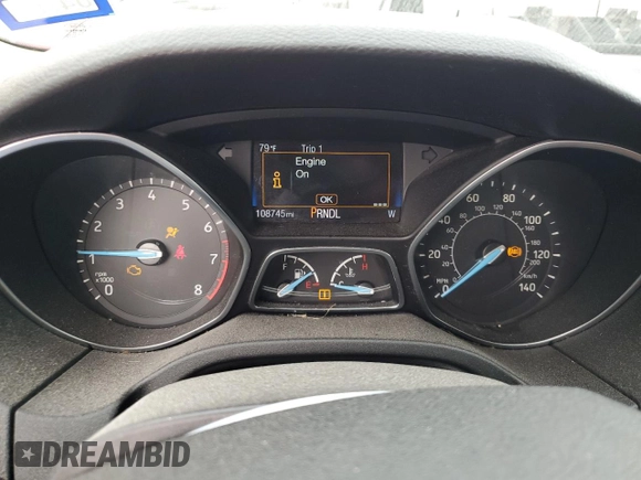 2017 Ford Focus SE z VIN 1FADP3F25HL299153, wystawiony jako Copart lot #53908065 z przebiegiem 108 745 mil mil oraz Szkoda całkowita • Salvage title. Historia ofert i sprzedaży dostępna na DreamBid. Obrazek 9.