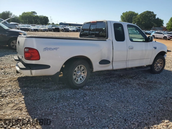 2003 Ford F-150 XL with VIN 1FTRX07W03KD12910, listed as a Copart auction lot 57864555 with Not provided miles and Salvage title. Bid and sale history available at DreamBid. Image 3.