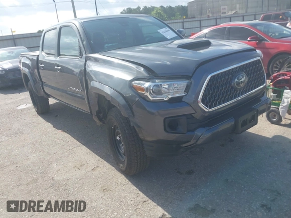 2018 Toyota Tacoma SR5 with VIN 3TMDZ5BN0JM051283, listed as a IAAI auction lot 42438690 with 106,155 mi miles and . Bid and sale history available at DreamBid. Image 6.