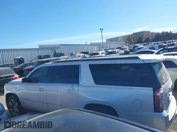 2015 GMC Yukon XL SLT with VIN 1GKS2HKC0FR179223, listed as a IAAI auction lot 40964120 with 184,592 mi miles. Bid and sale history available at carsss.com. Image 14.