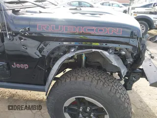 2020 Jeep Wrangler Unlimited Rubicon with VIN 1C4HJXFG1LW141335, listed as a IAAI auction lot 42724973 with 59,843 mi miles and . Bid and sale history available at DreamBid. Image 17.