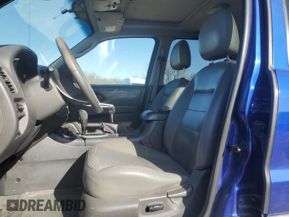 2006 Ford Escape XLT with VIN 1FMYU93136KA51162, listed as a Copart auction lot 52239385 with 227,666 mi miles and Salvage title. Bid and sale history available at DreamBid. Image 7.