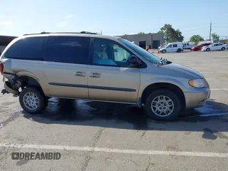 2003 Dodge Caravan Sport with VIN 2D4GP44R73R279132, listed as a IAAI auction lot 42100140 with 218,201 mi miles and . Bid and sale history available at carsss.com. Image 13.