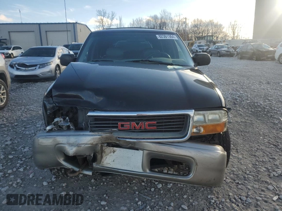 2000 GMC Jimmy SLE Convenience z VIN 1GKDT13W7Y2393191, wystawiony jako Copart lot #82301364 z przebiegiem 160 004 mil mil oraz Czysty tytuł • Clean title. Historia ofert i sprzedaży dostępna na DreamBid. Obrazek 5.